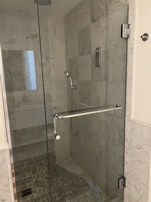 5 Bridge Dartmouth Ma, Unit 2 North Dartmouth, MA 02747 - Photo 3 of 5 a bathroom with a shower