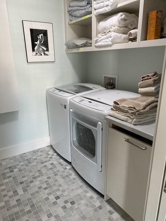 5 Bridge Dartmouth Ma, Unit 2 North Dartmouth, MA 02747 - Photo 4 of 5 a utility room with dryer and washer