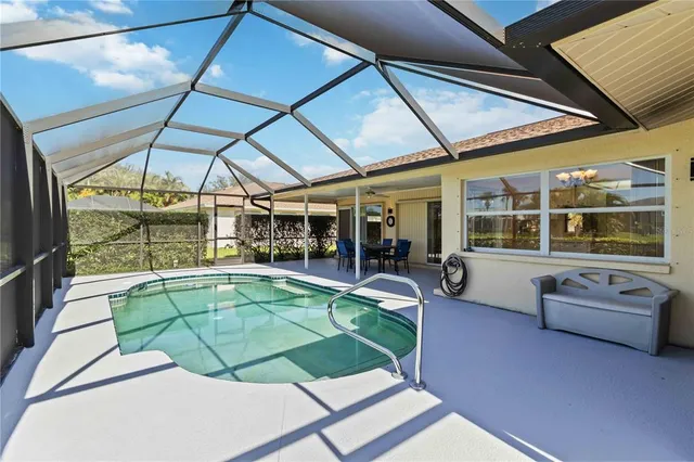 a view of a swimming pool with a porch