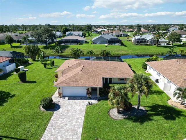 an aerial view of a house with garden