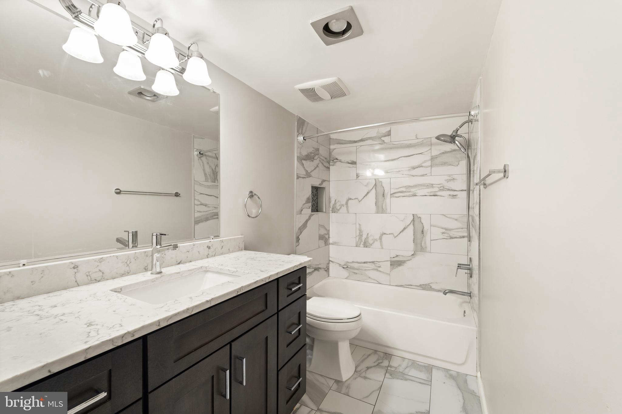 1800 Old Meadow Road, Unit 916 McLean, VA 22102 - Photo 10 of 47 Updated bathroom