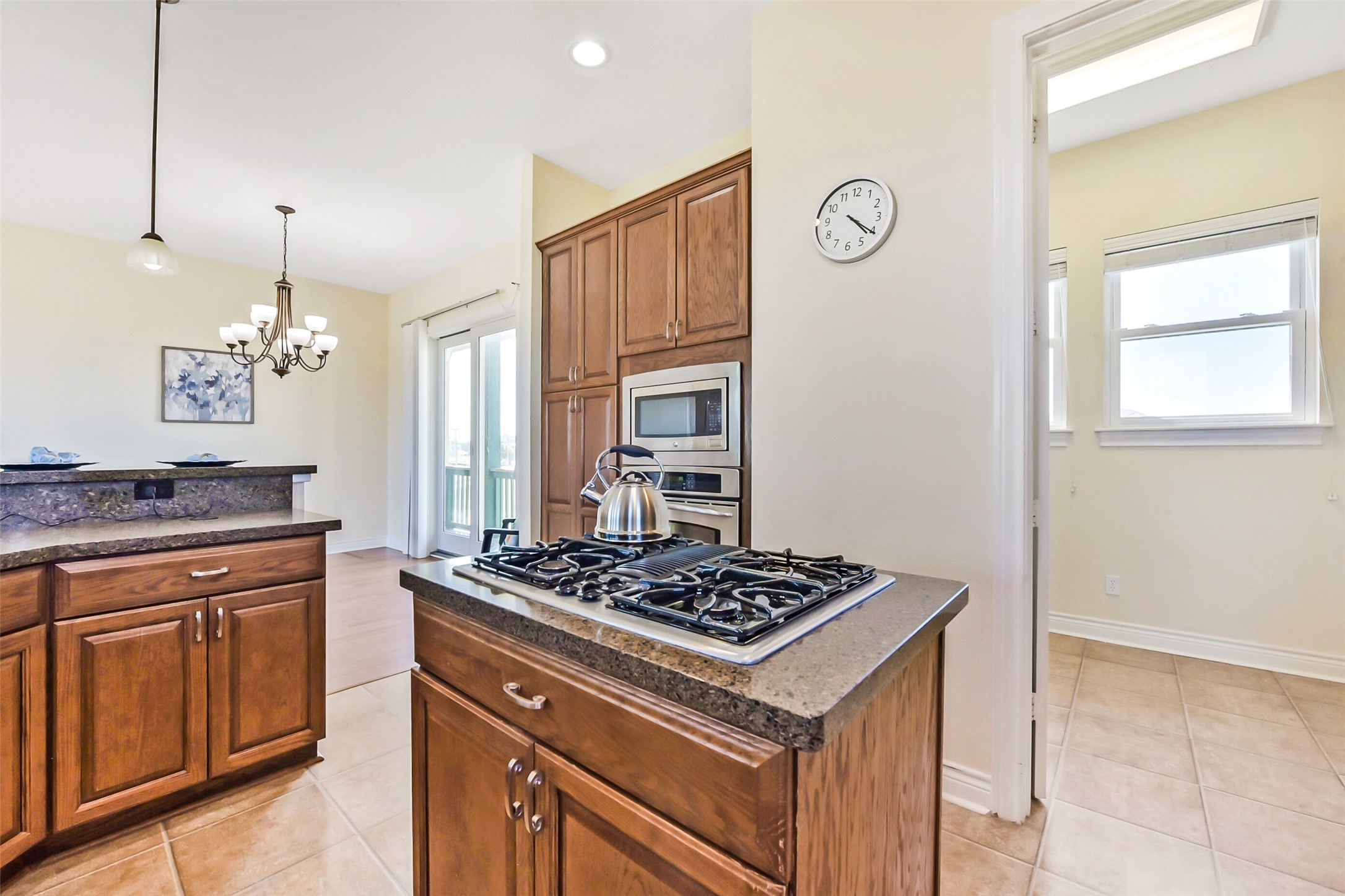 1 Loggerhead Hitchcock, TX 77563 - Photo 13 of 49 a kitchen with a stove and a refrigerator