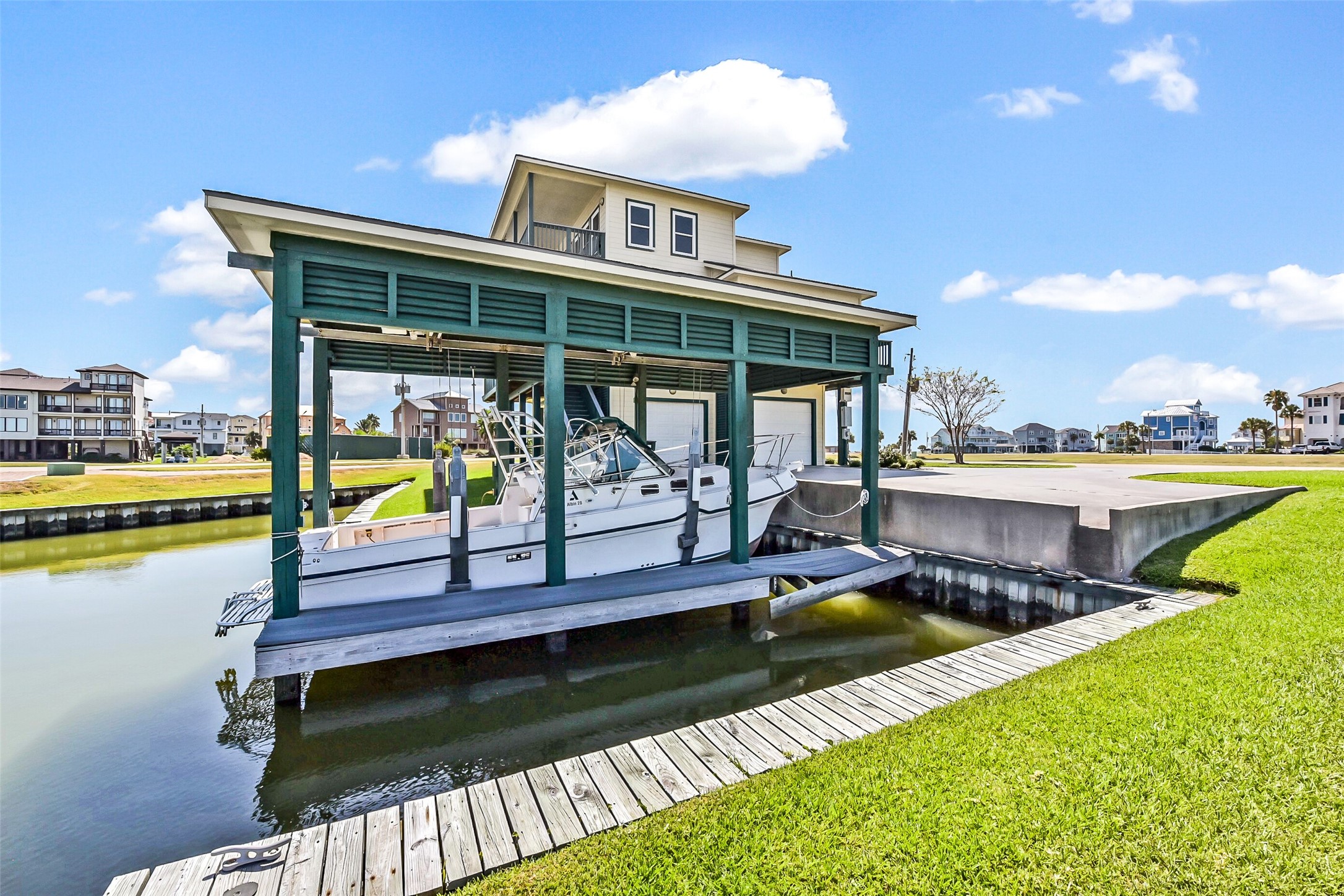 1 Loggerhead Hitchcock, TX 77563 - Photo 5 of 49 a view of a swimming pool with a deck and a patio