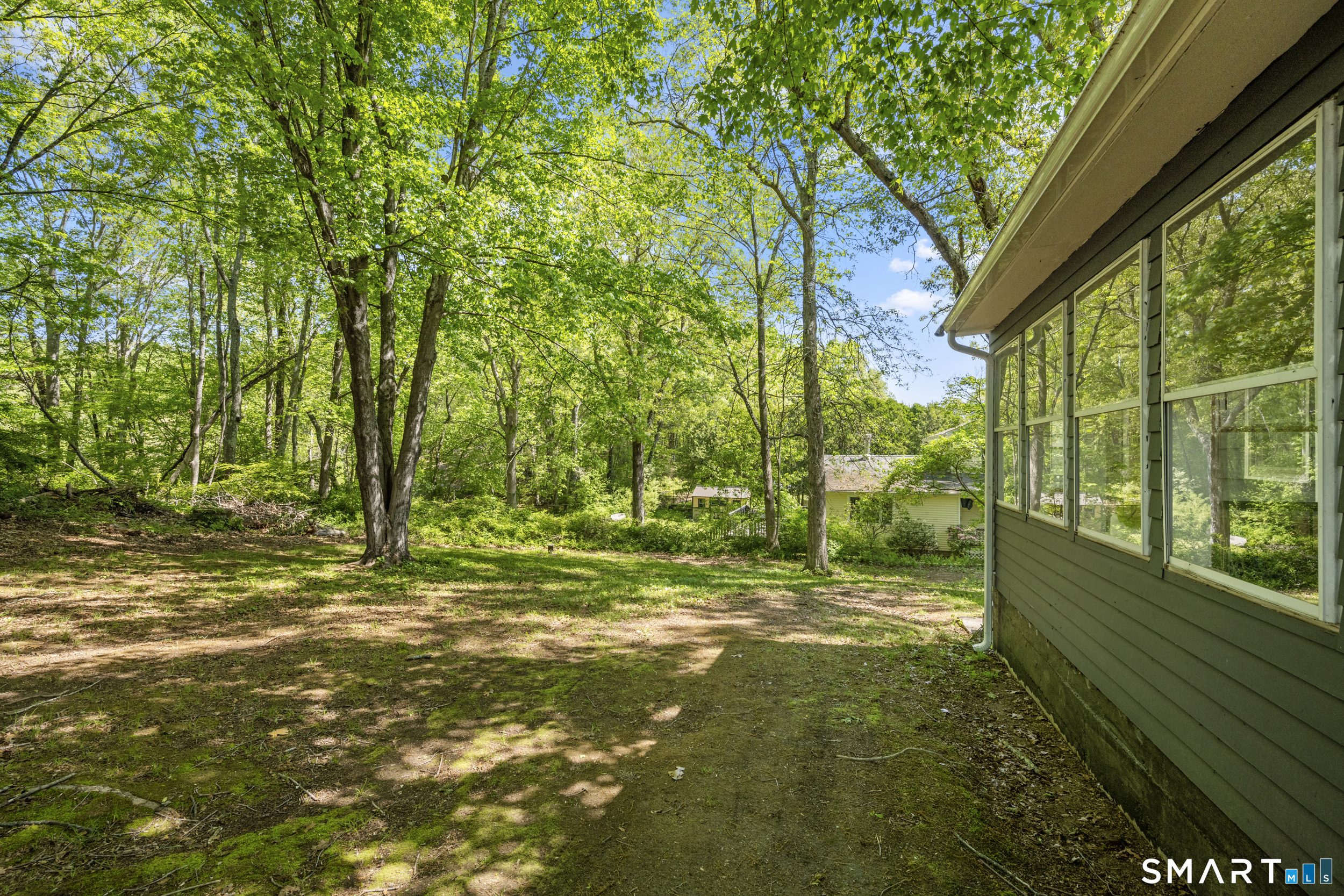 121 River Road Preston, CT 06365 - Photo 28 of 37 a backyard of a house with lots of green space