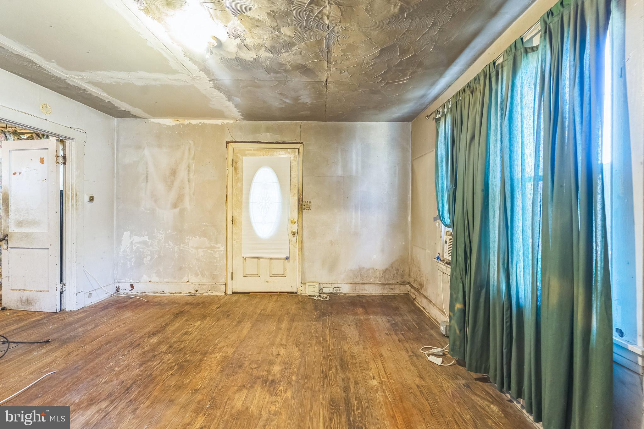 912 Windsor Avenue Annapolis, MD 21403 - Photo 8 of 29 a view of a room with wooden floor and windows