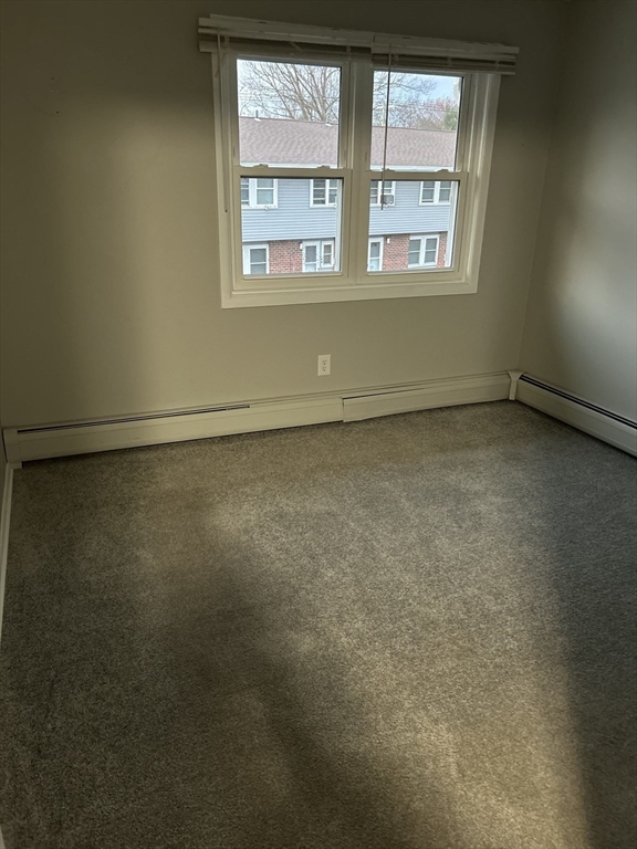 5 Manor Court, Unit 5 Springfield, MA 01118 - Photo 19 of 19 an empty room with a window