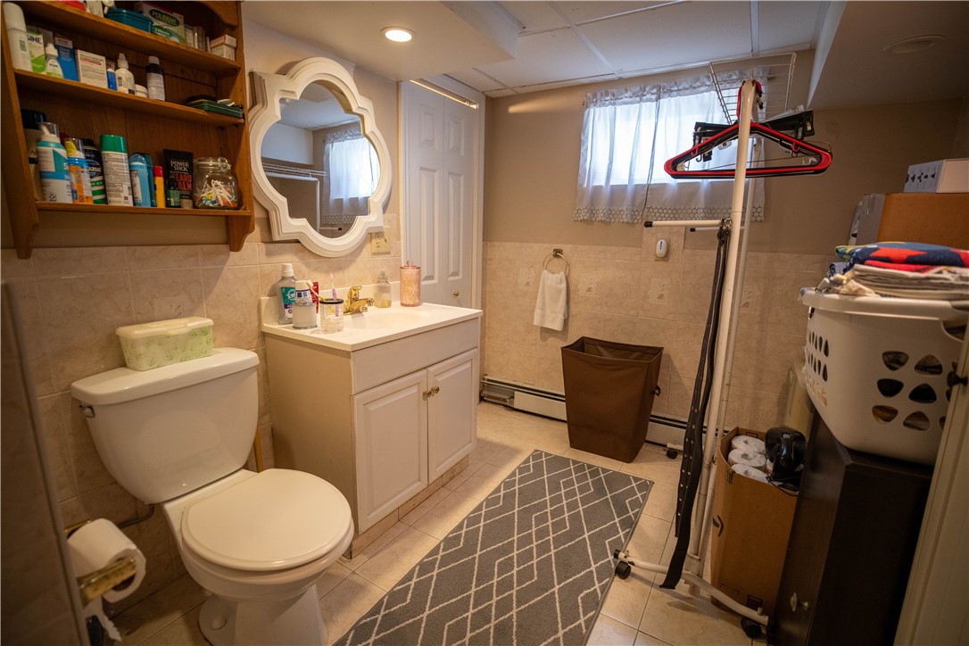 21 Madison Street Warwick, RI 02888 - Photo 13 of 30 Large basement half bath