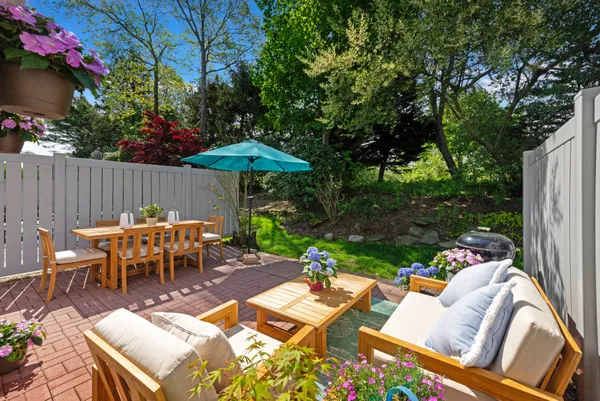 a view of a patio with furniture