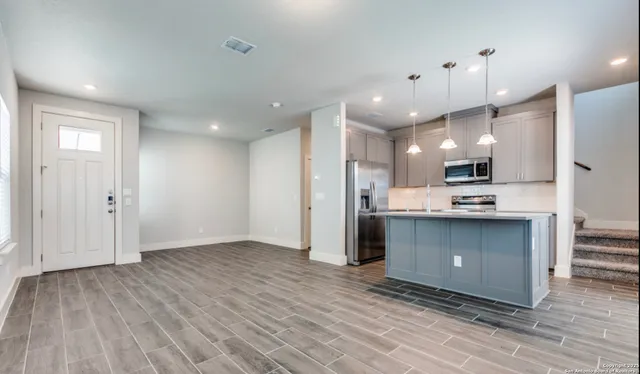 a view of kitchen and kitchen island
