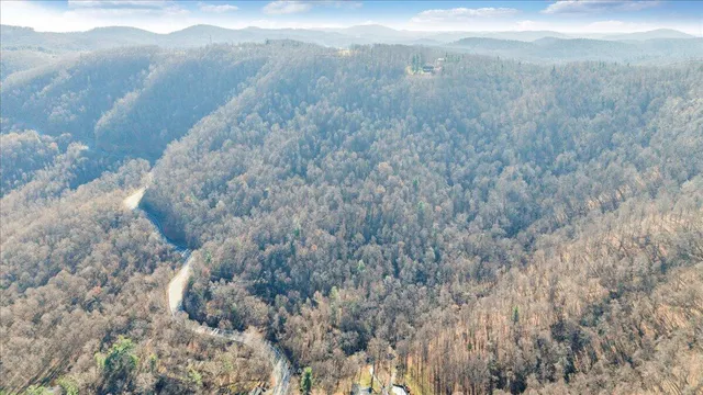 a view of a yard from a balcony