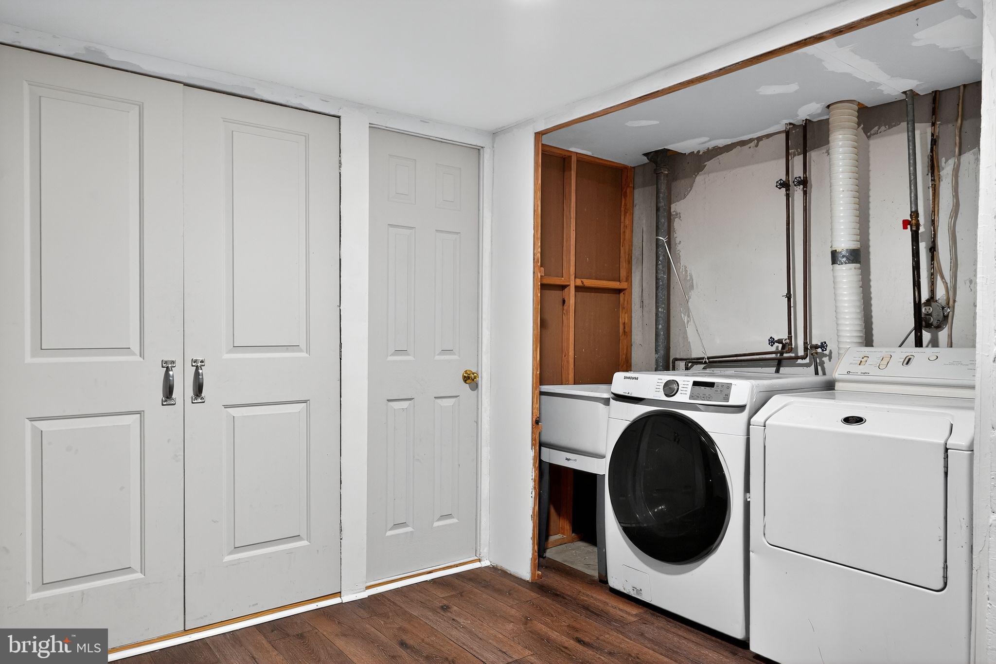 4401 Ridge Drive Baltimore, MD 21229 - Photo 25 of 30 a view of a hallway with washer and dryer