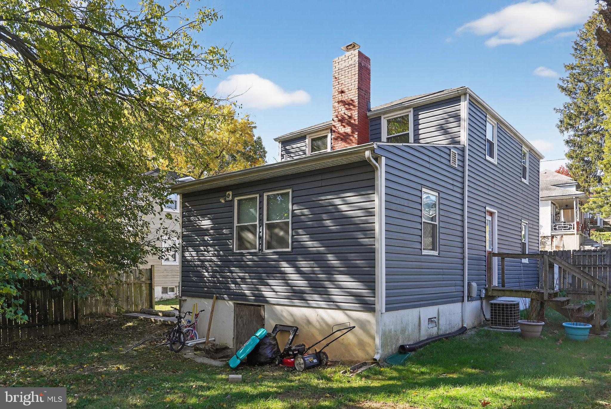 4401 Ridge Drive Baltimore, MD 21229 - Photo 28 of 30 a view of a house with a yard