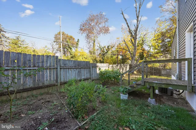 a garden view with a seating space