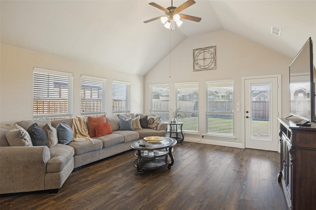3405 Fletcher Road Heartland, TX 75114 - Photo 4 of 30 View of sizeable living area with plenty of windows for an abundance of natural light.