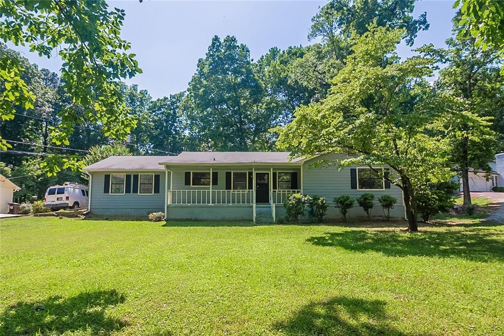 108 Allen Road Hiram, GA 30141 - Photo 1 of 1 a front view of a house with garden