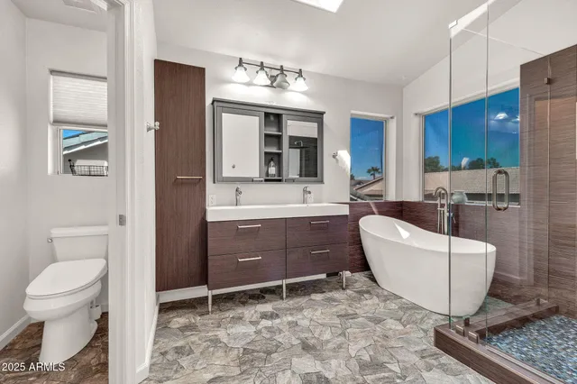 a bed room with a bed and a dresser