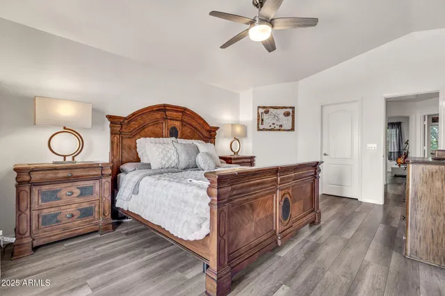 a bathroom with a sink mirror and a bathtub