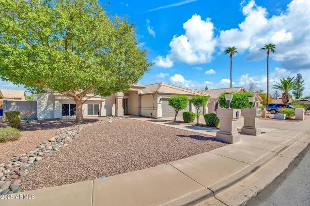 a view of a house with a street