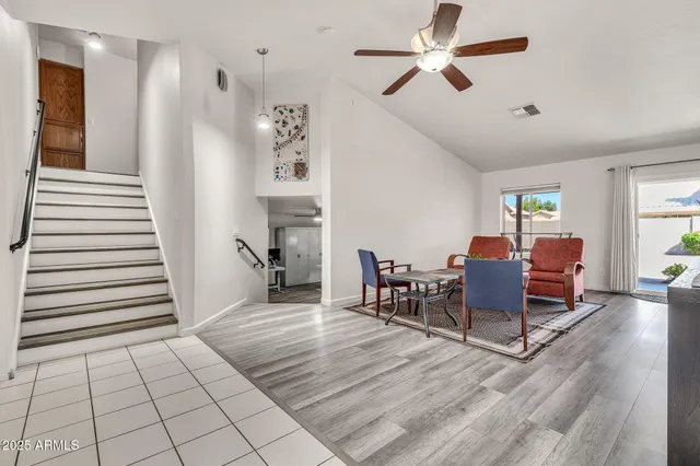 a view of kitchen with sink microwave and refrigerator