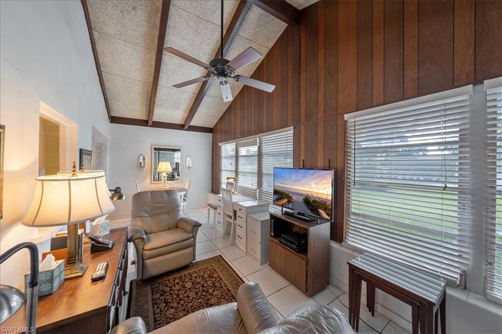 1069 Forest Lakes Drive, Unit 1B Naples, FL 34105 - Photo 18 of 29 a living room with furniture