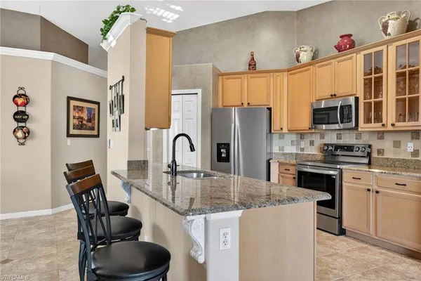 $459,000 | 6846 Sterling Greens Drive, Unit 202, Naples, FL 34104