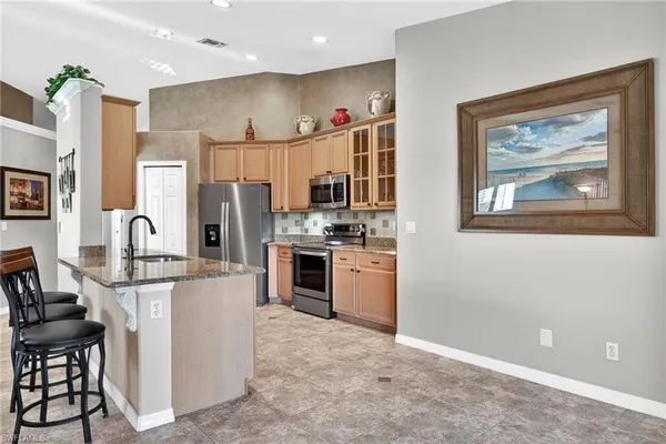 $459,000 | 6846 Sterling Greens Drive, Unit 202, Naples, FL 34104
