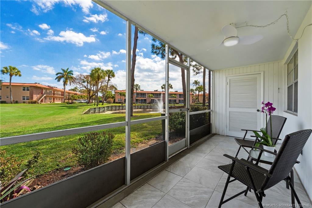 1903 Southwest Palm City Road, Unit C Stuart, FL 34994 - Photo 12 of 34 a view of a porch with furniture and garden