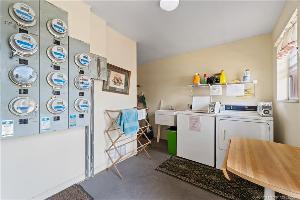 1903 Southwest Palm City Road, Unit C Stuart, FL 34994 - Photo 26 of 34 a room with storage and utility