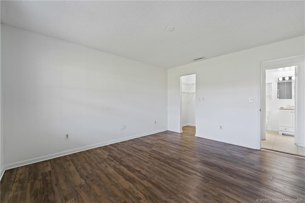 1903 Southwest Palm City Road, Unit C Stuart, FL 34994 - Photo 31 of 34 wooden floor in a room