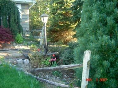 5864 Old Carriage Road Bath, PA 18014 - Photo 4 of 5 a view of a flower in a garden