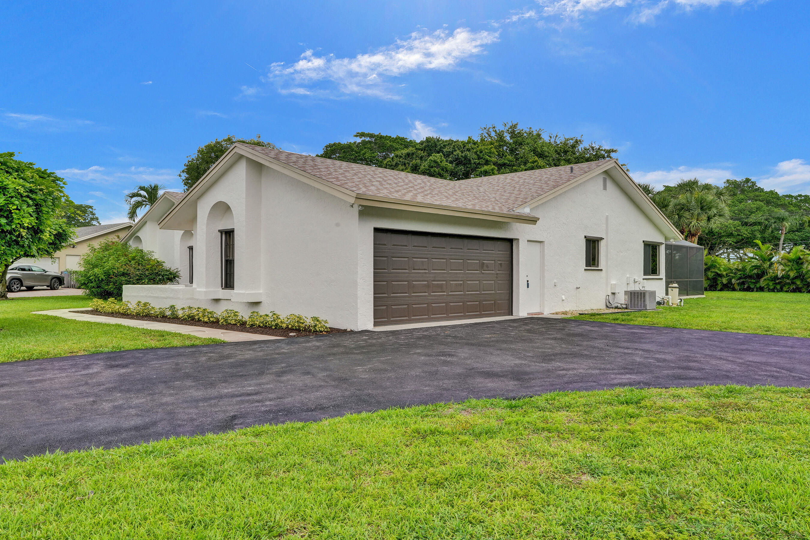 18201 104th Terrace South Boca Raton, FL 33498 - Photo 74 of 77 2 car garage & circular driveway