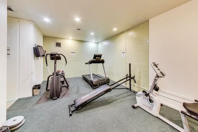 a view of a room with gym equipment