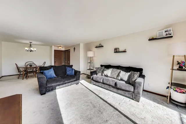 a living room with furniture and a couch