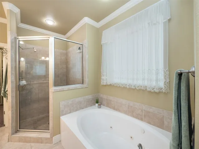 a bathroom with a granite countertop sink mirror and toilet