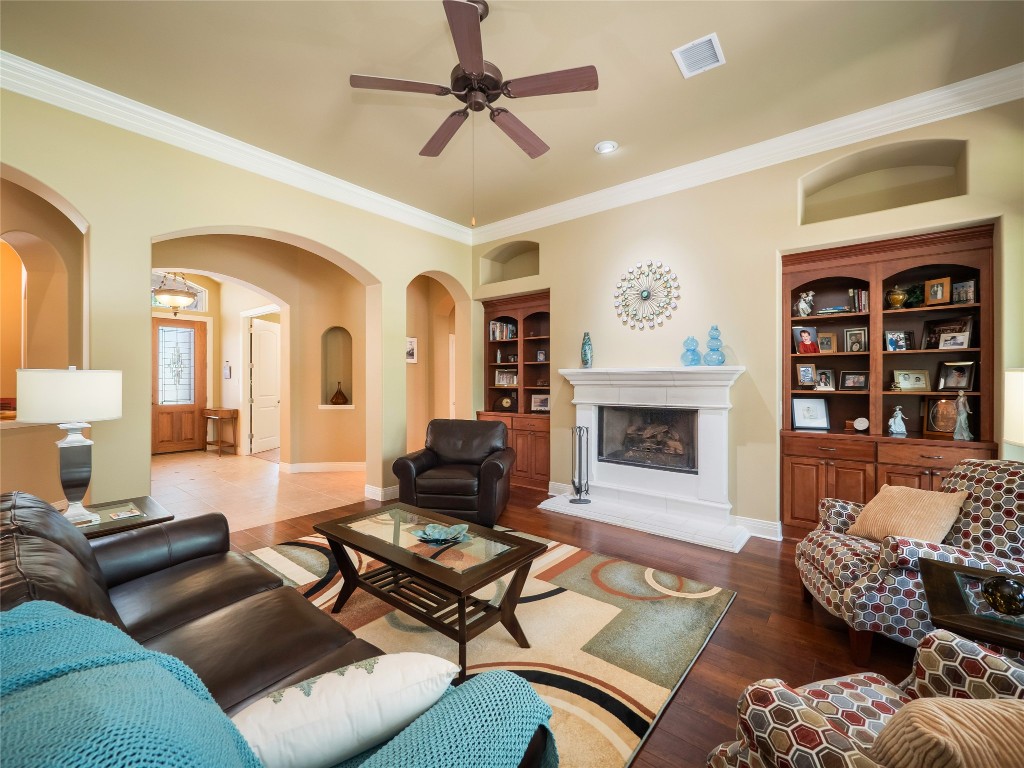 104 East Rustle Cove Georgetown, TX 78628 - Photo 6 of 40 a living room with furniture fireplace and rug
