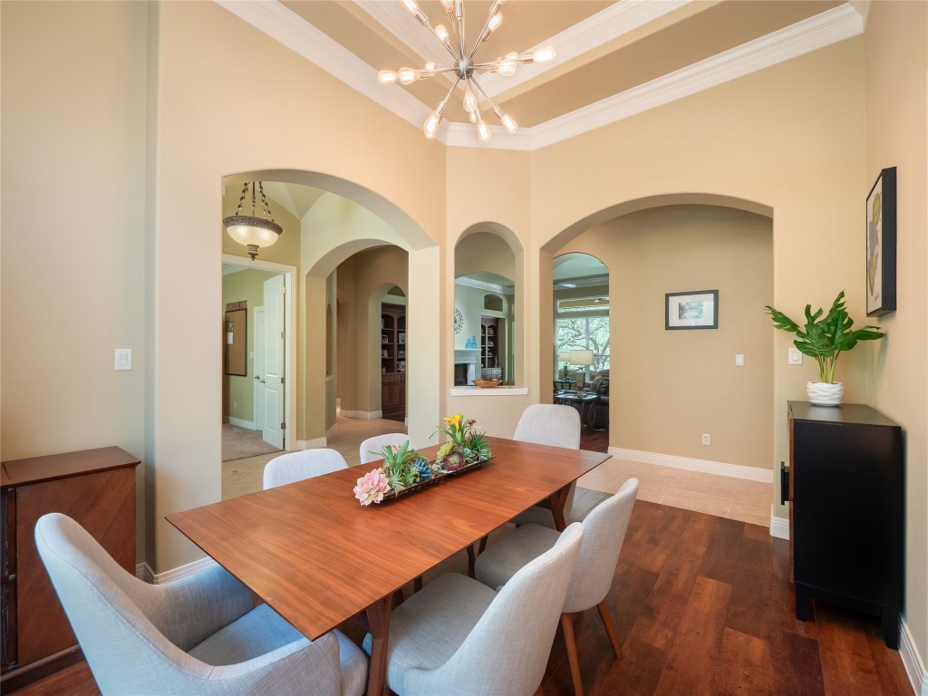 104 East Rustle Cove Georgetown, TX 78628 - Photo 8 of 40 a view of a dining room with furniture