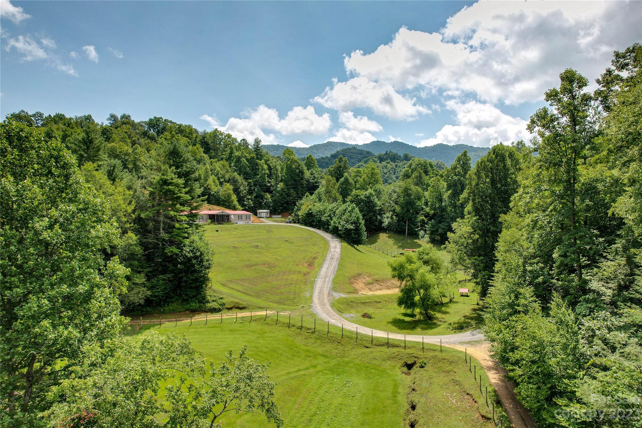 a view of a yard with swimming pool