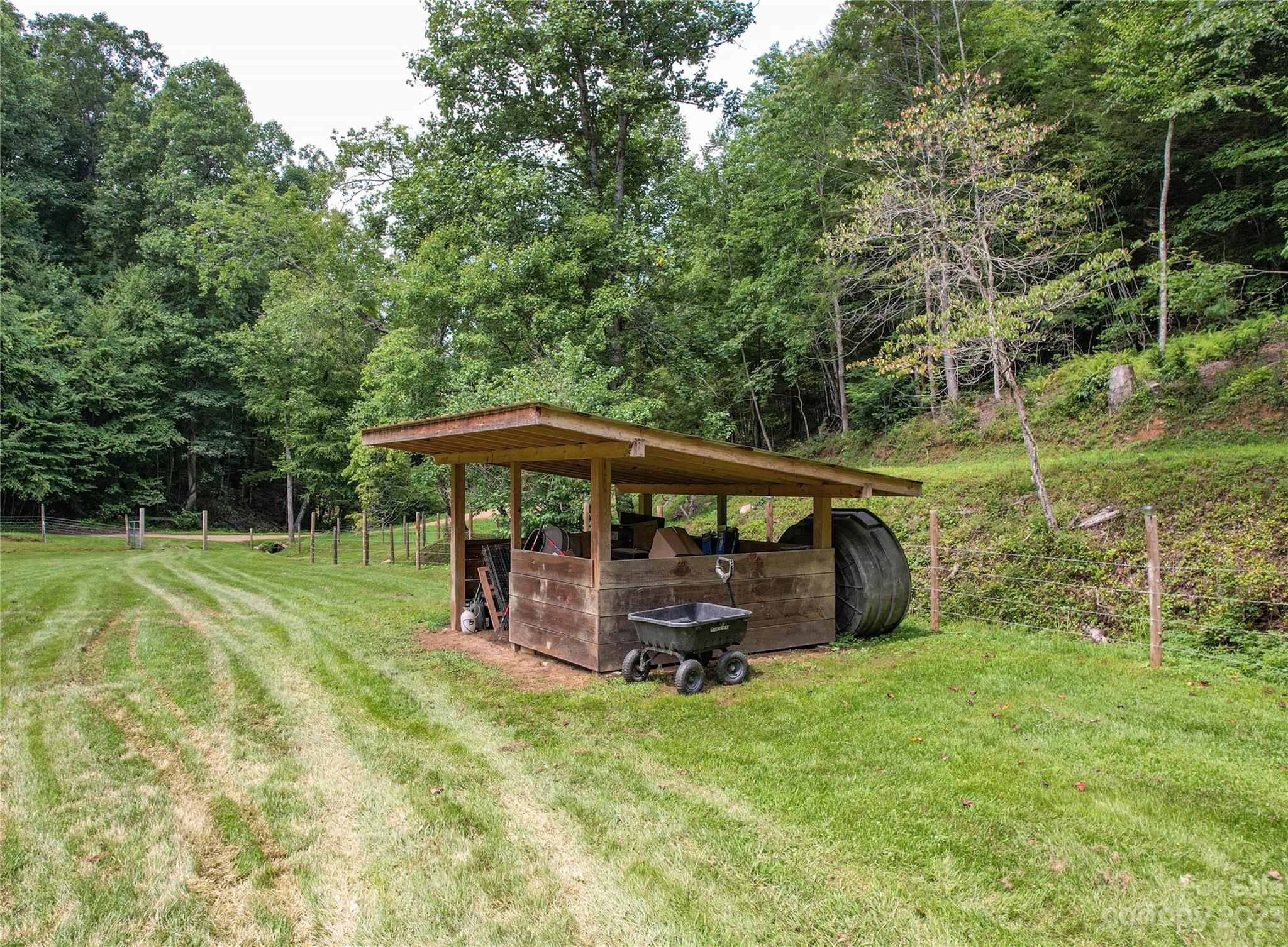 3113 Revere Road Marshall, NC 28753 - Photo 13 of 47 a view of a deck with a big yard