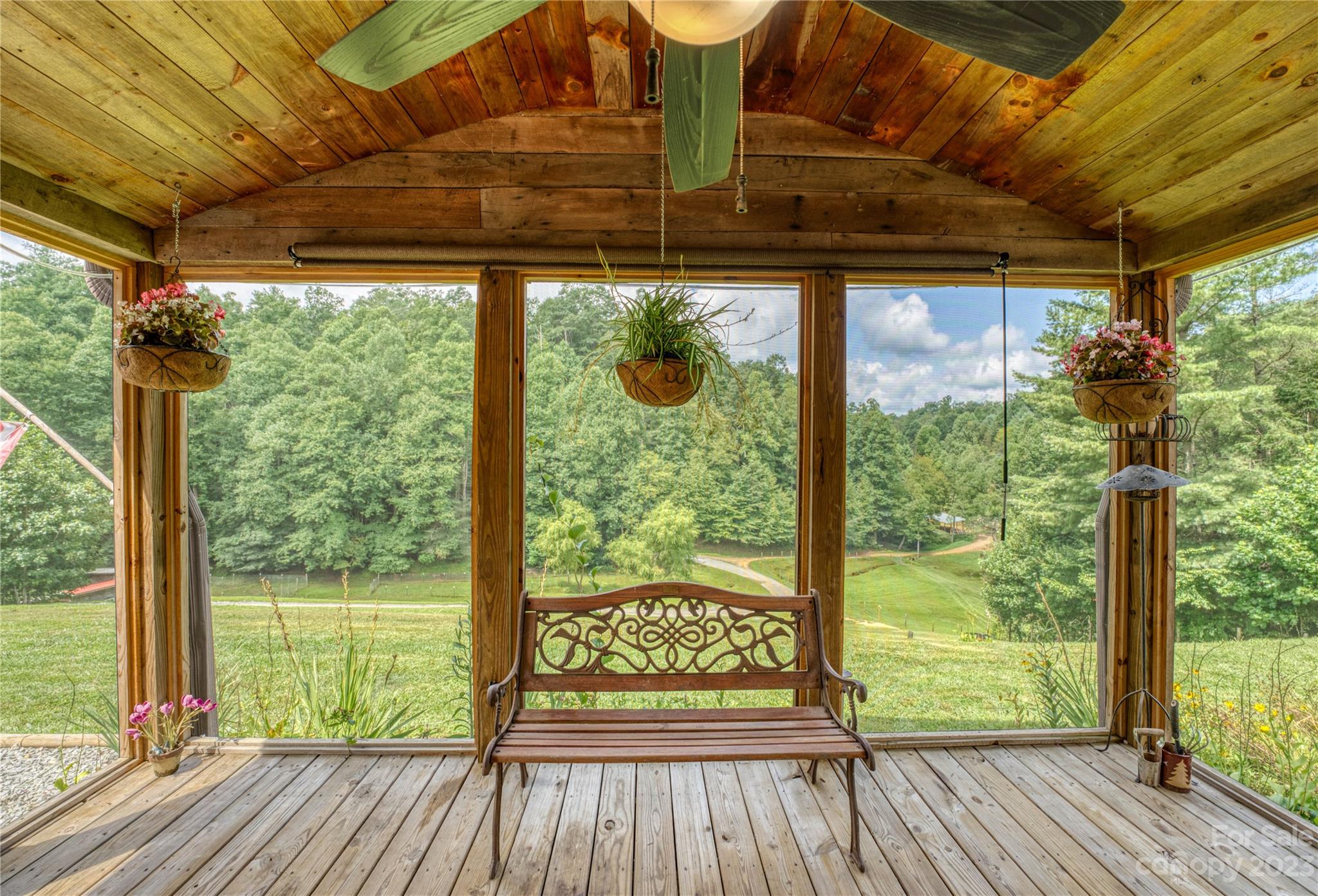 3113 Revere Road Marshall, NC 28753 - Photo 22 of 47 a view of a room with wooden floor and outdoor view