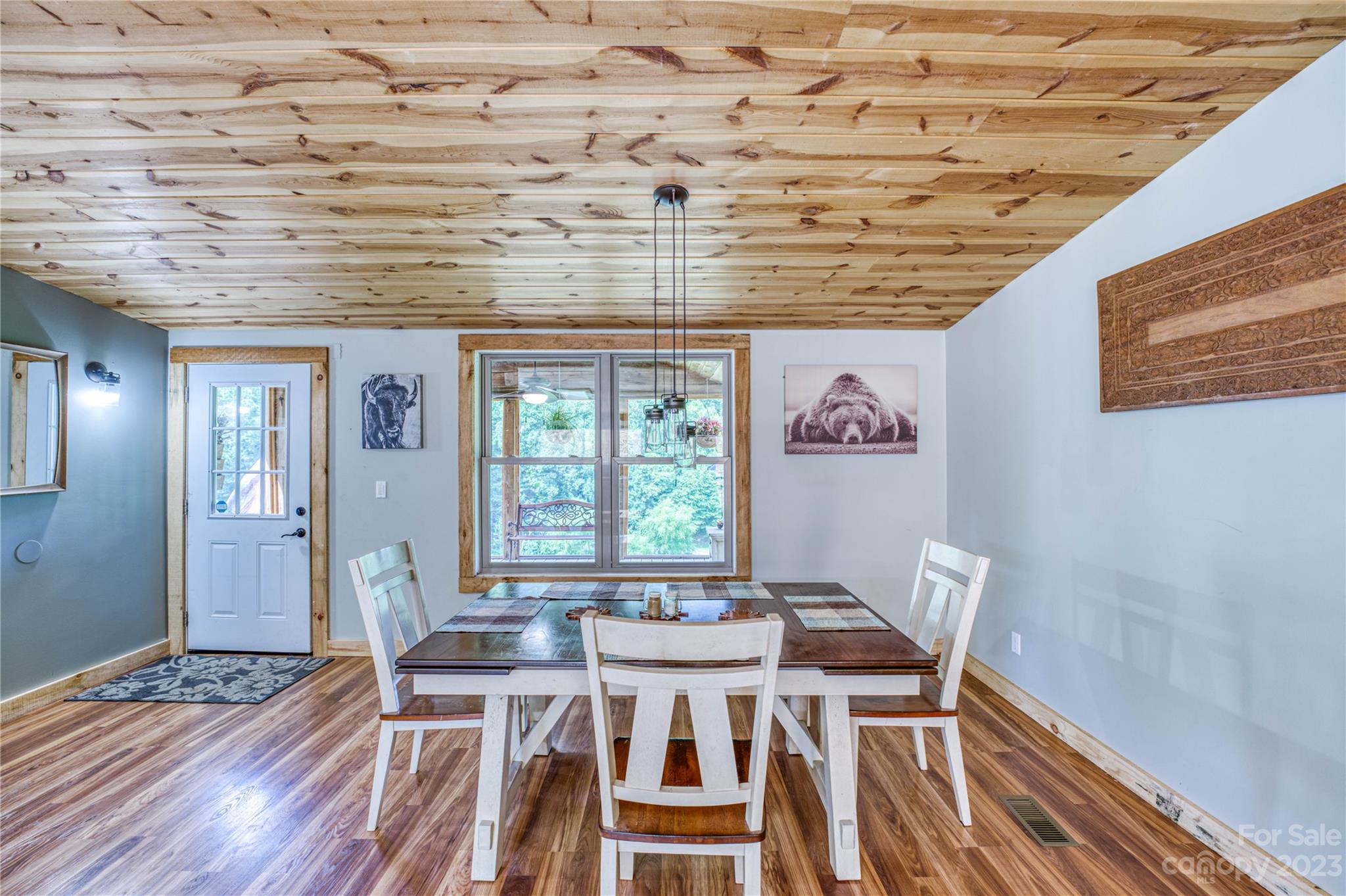 3113 Revere Road Marshall, NC 28753 - Photo 27 of 47 a view of a dining room with furniture and wooden floor