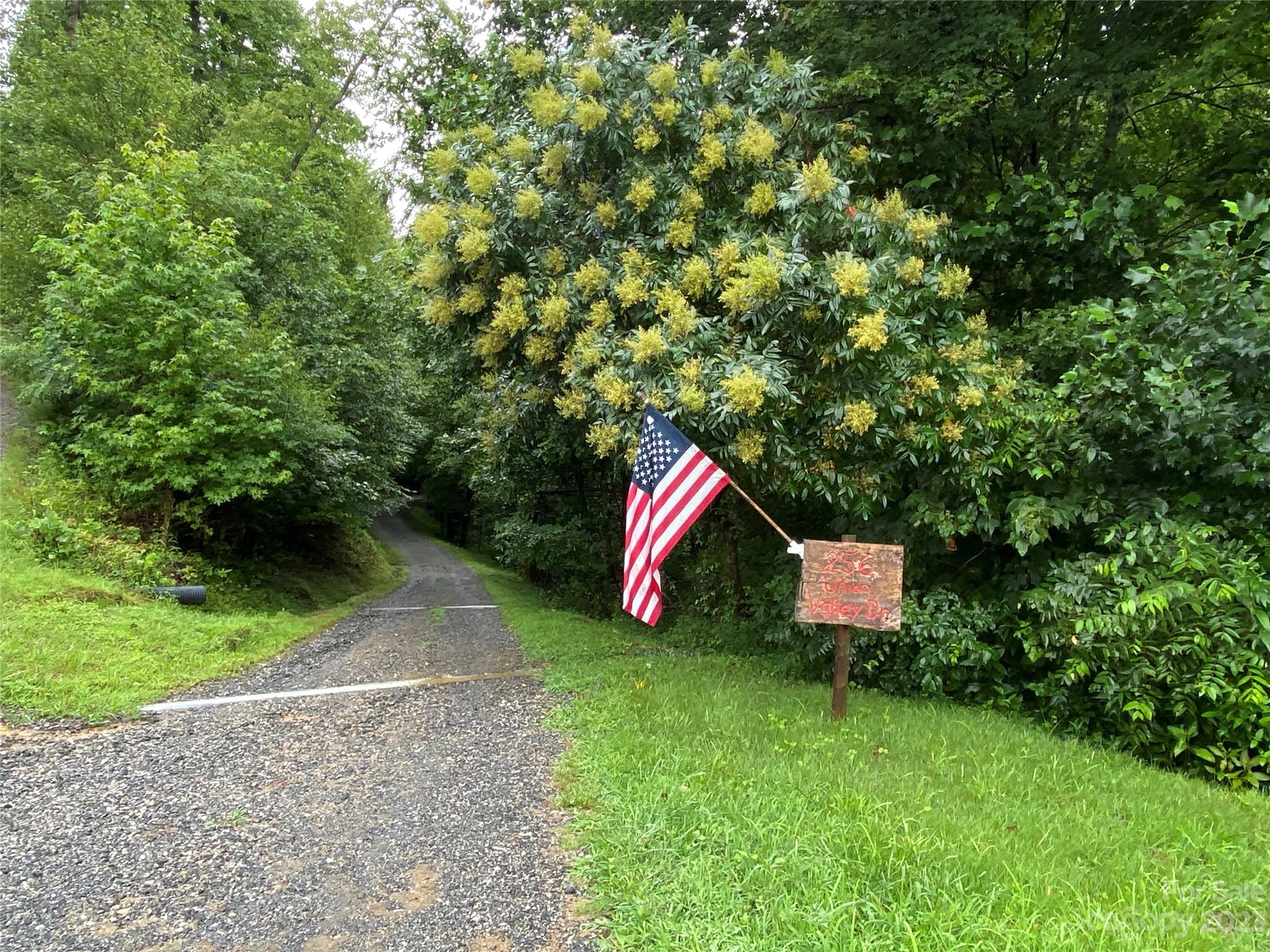 3113 Revere Road Marshall, NC 28753 - Photo 44 of 47 a view of a bench in the garden