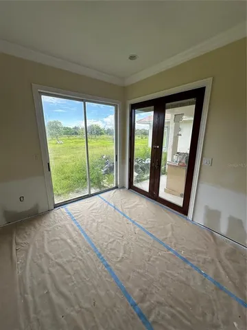 a view of a room with large window