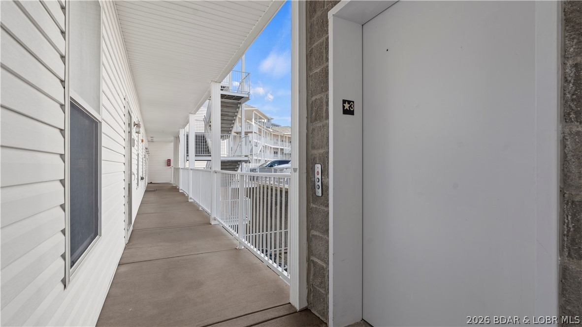 64 Knox Road, Unit N304 Rocky Mount, MO 65072 - Photo 36 of 50 Elevator- Main Level Unit from parking