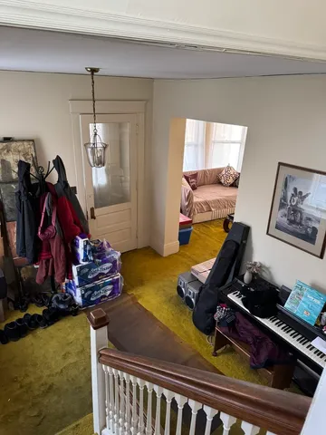 a view of tree in front of a house