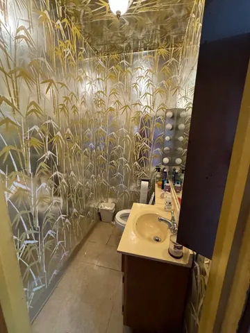 a bathroom with a sink and a shower
