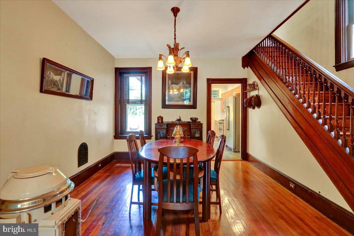 315 Nevin Street Lancaster, PA 17603 - Photo 11 of 41 a view of a dining room with furniture window and wooden floor