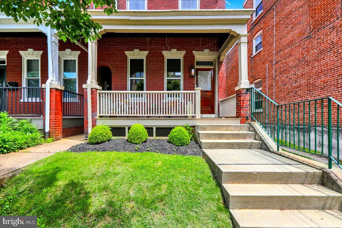 315 Nevin Street Lancaster, PA 17603 - Photo 2 of 41 front view of a house with a small yard