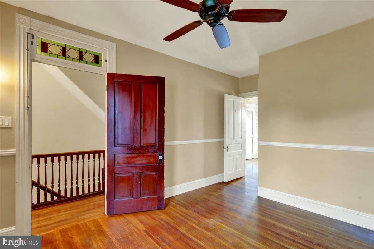 315 Nevin Street Lancaster, PA 17603 - Photo 23 of 41 a view of a hallway with wooden floor and entryway