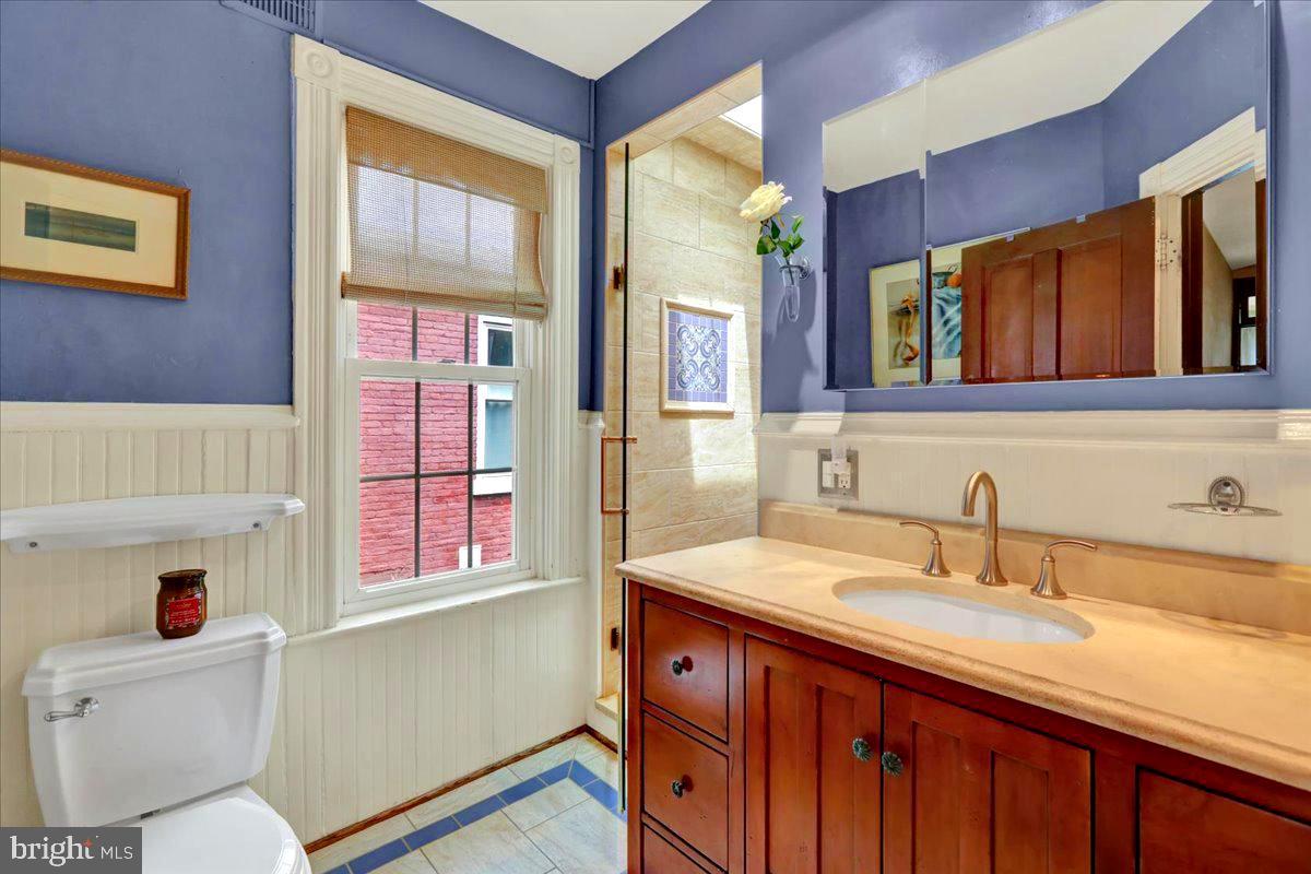 315 Nevin Street Lancaster, PA 17603 - Photo 26 of 41 a bathroom with a sink a vanity and a toilet