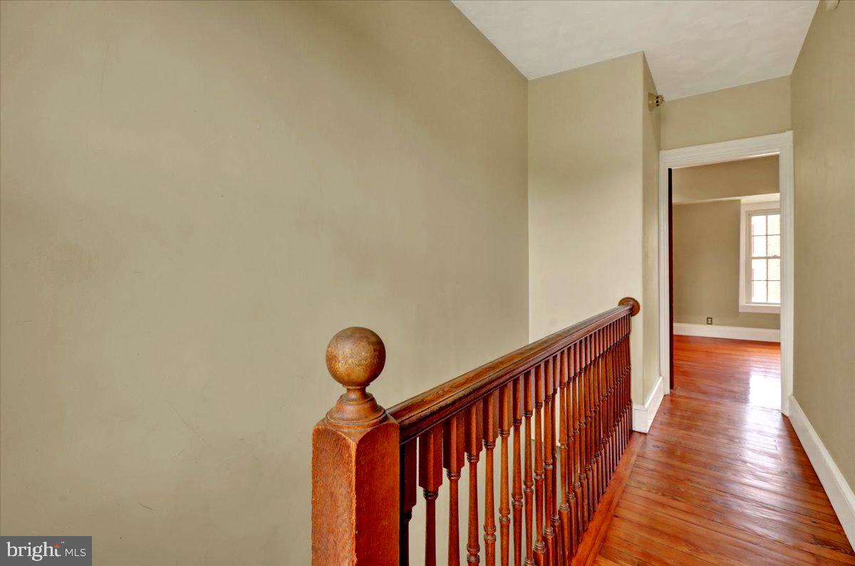315 Nevin Street Lancaster, PA 17603 - Photo 31 of 41 a view of a hallway with wooden floor